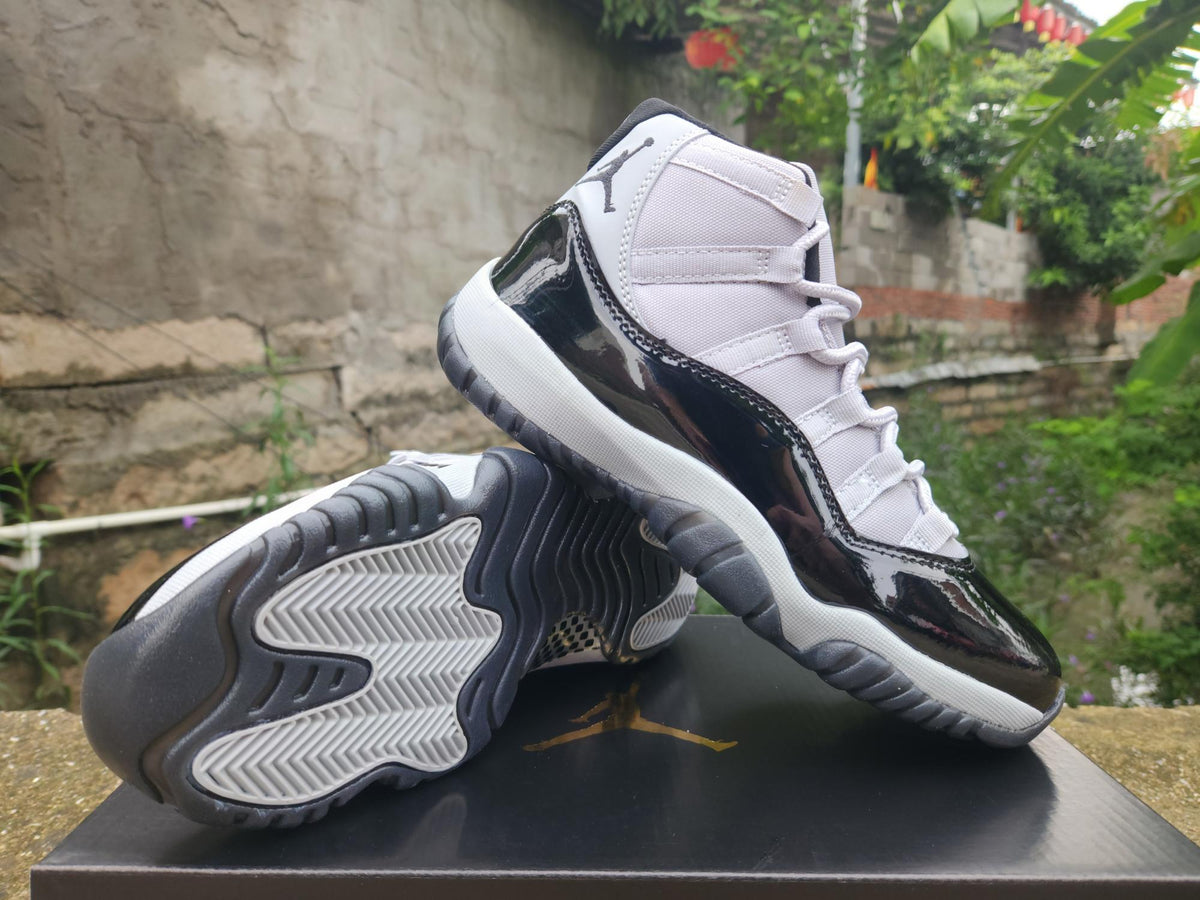 Air Jordan 11 White, Black & Gray Sneakers