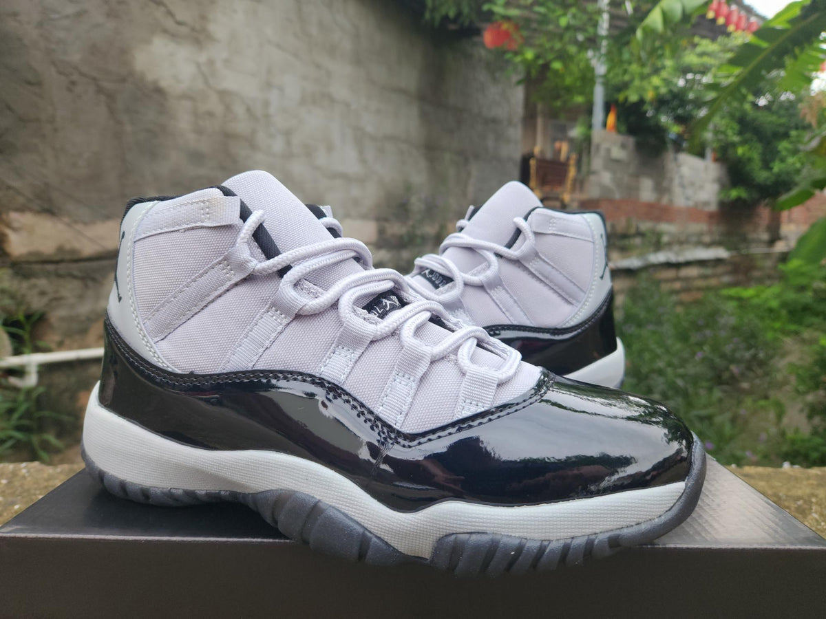 Air Jordan 11 White, Black & Gray Sneakers