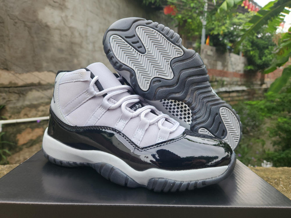 Air Jordan 11 White, Black & Gray Sneakers