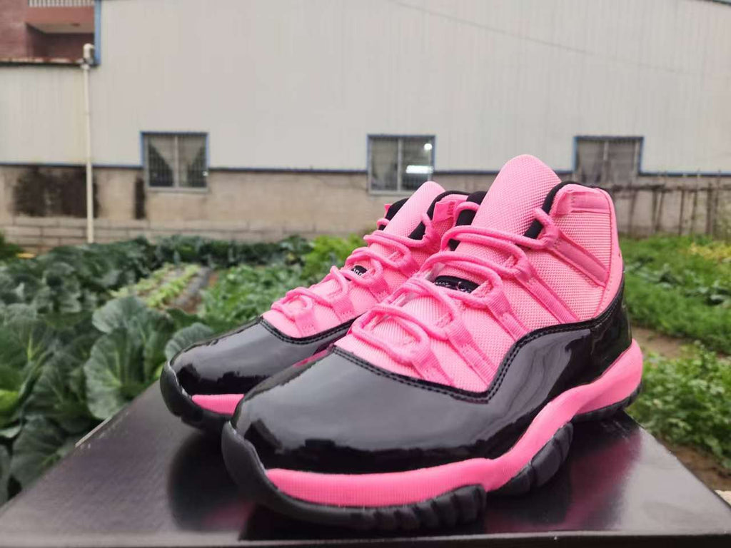 Air Jordan 11 Retro Black / Pink