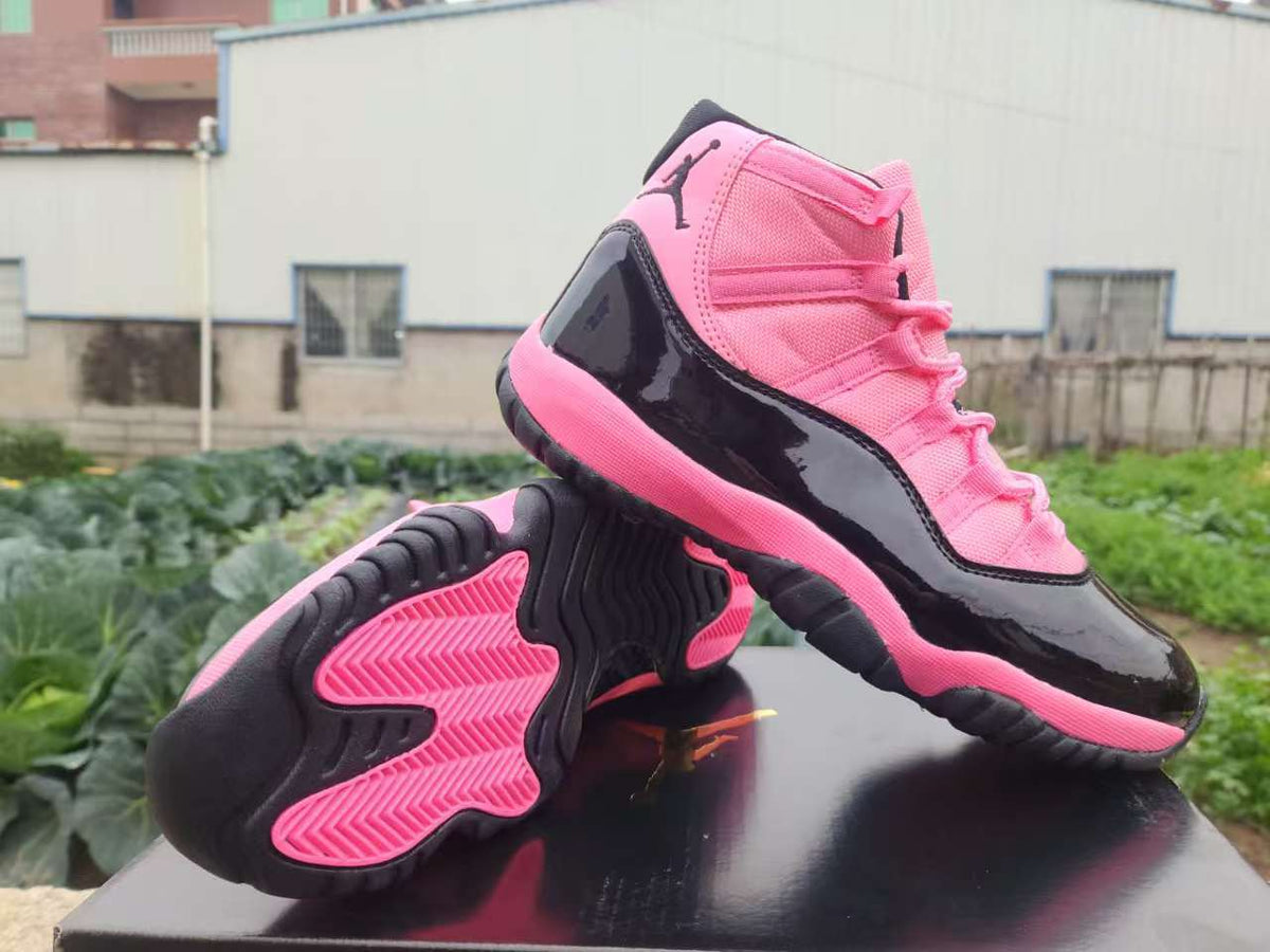 Air Jordan 11 Retro Black / Pink